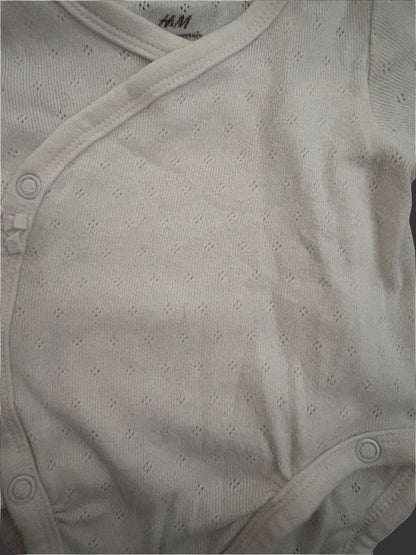 Close-up of white baby onesie