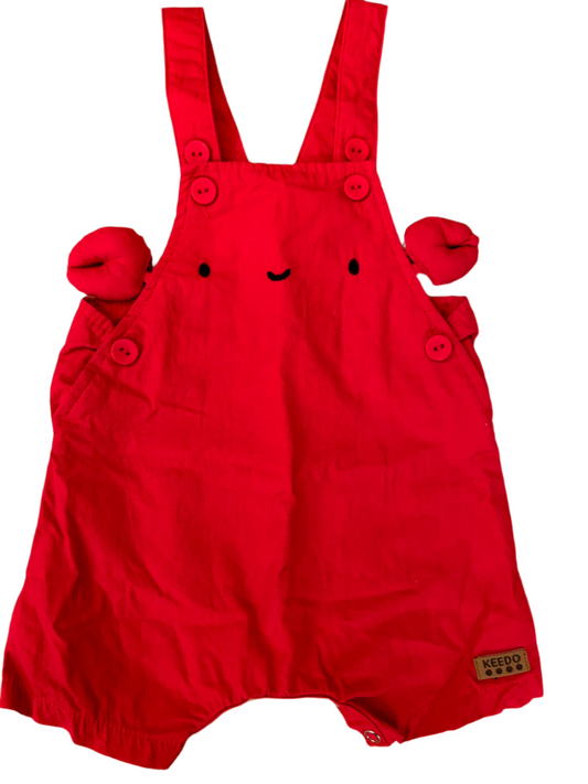 Rode baby jumpsuit - maat 68 (3-6M)