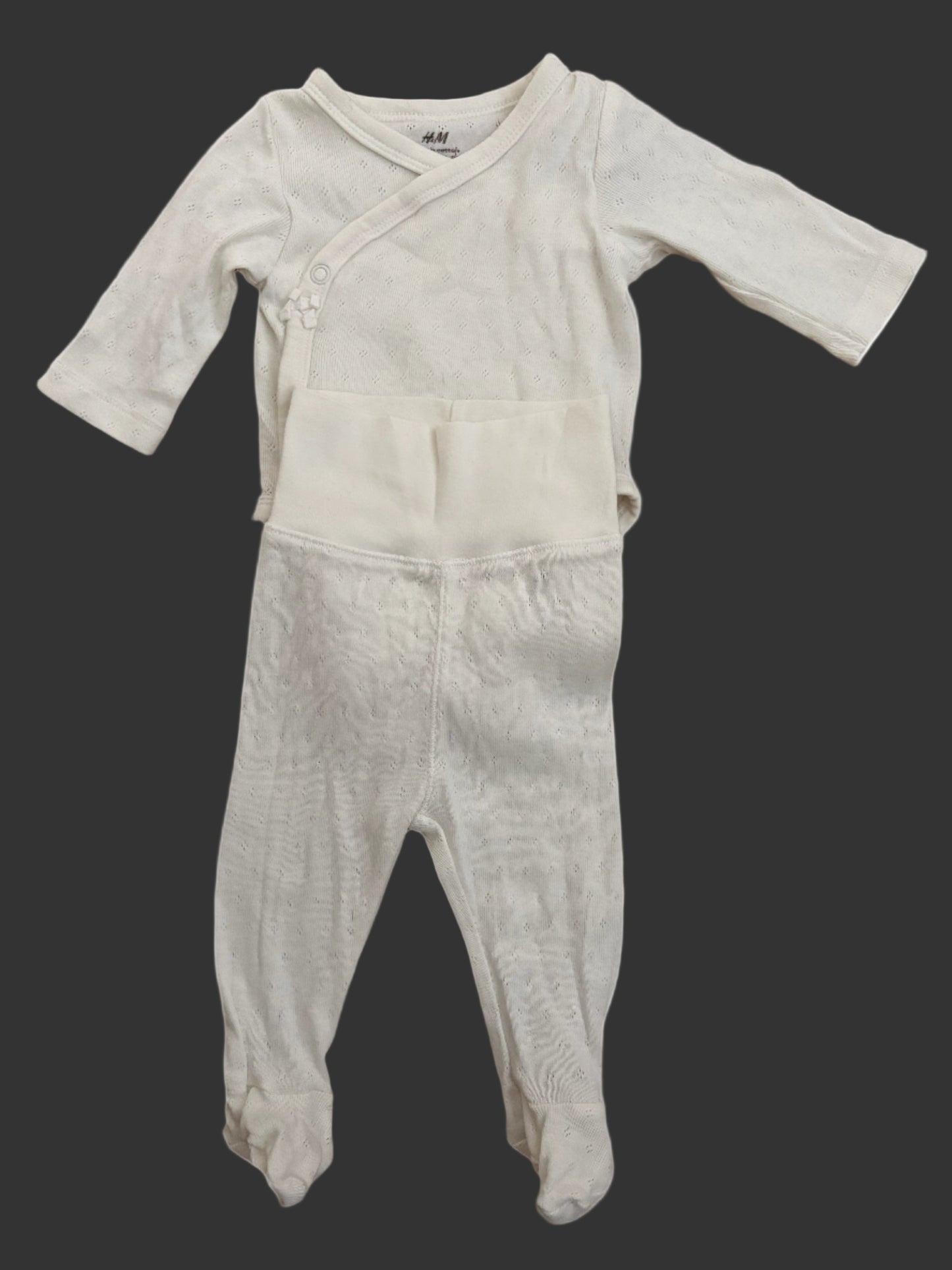 White baby onesie and pants